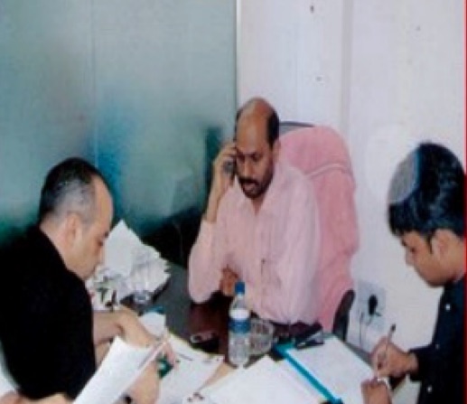Employer representatives reviewing candidate files